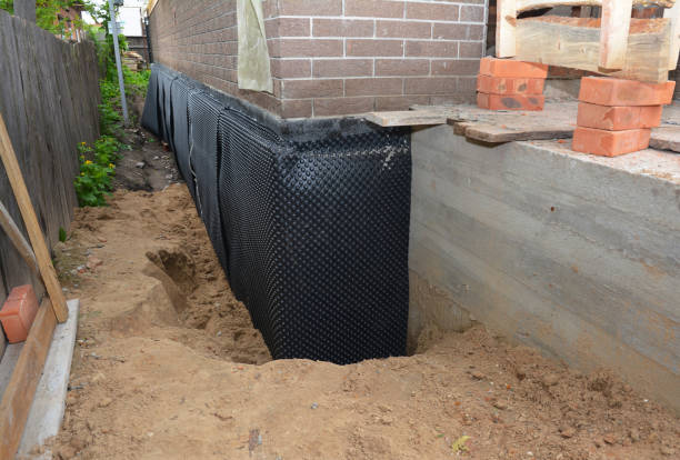 SJ Waterproofing Pros technician performing targeted Waterproofing assessment in North Collins, NY